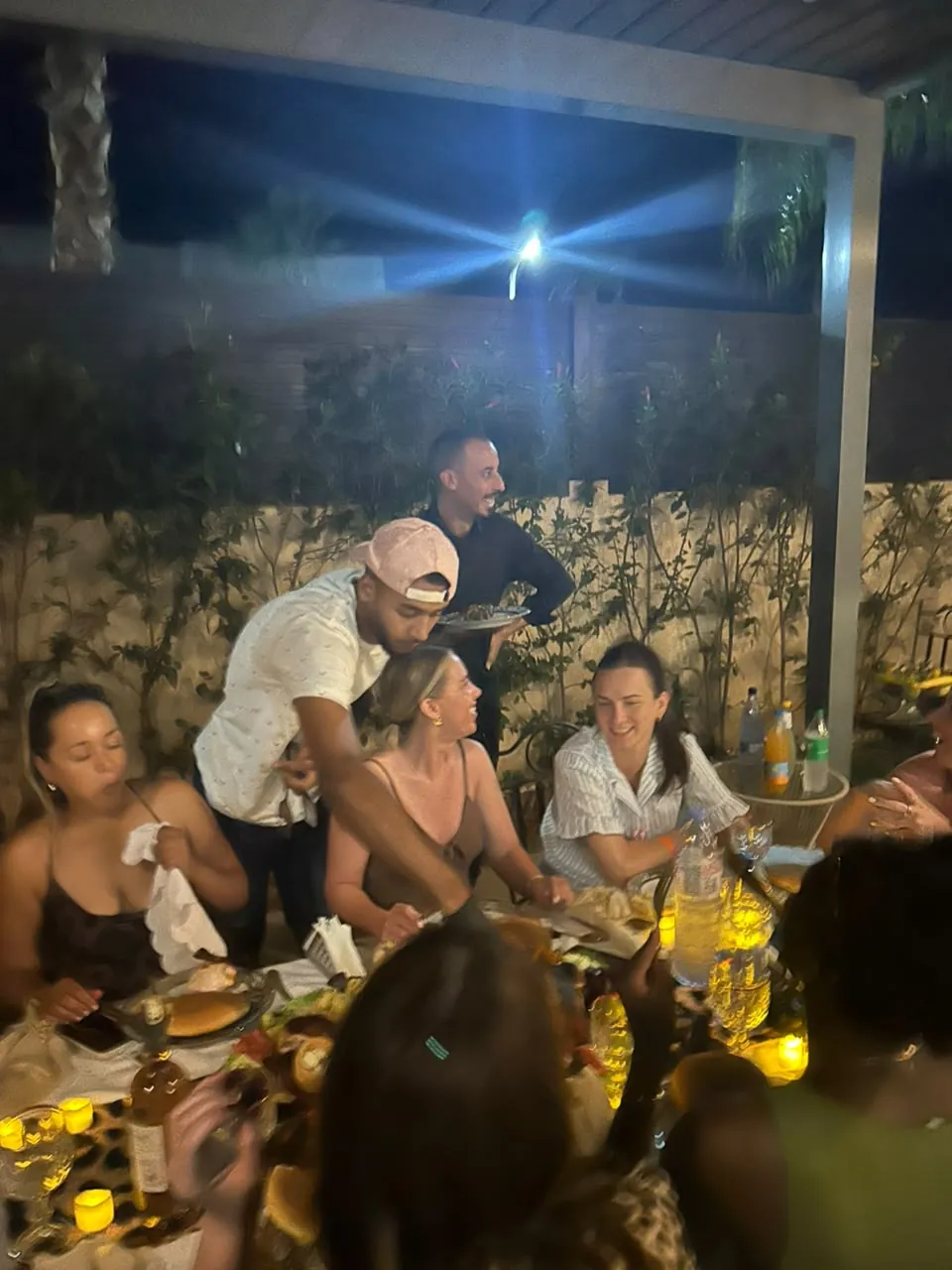 Friends celebrating together during a private Marrakech dinner