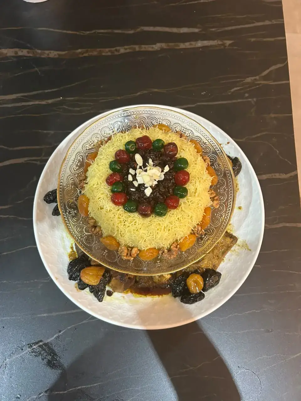 Moroccan sweet and savoury platter with dried fruit, almonds and slow-cooked meat